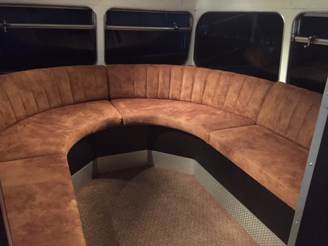 brown settee seating static bus hire