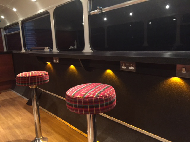 stools with cool lighting static bus hire